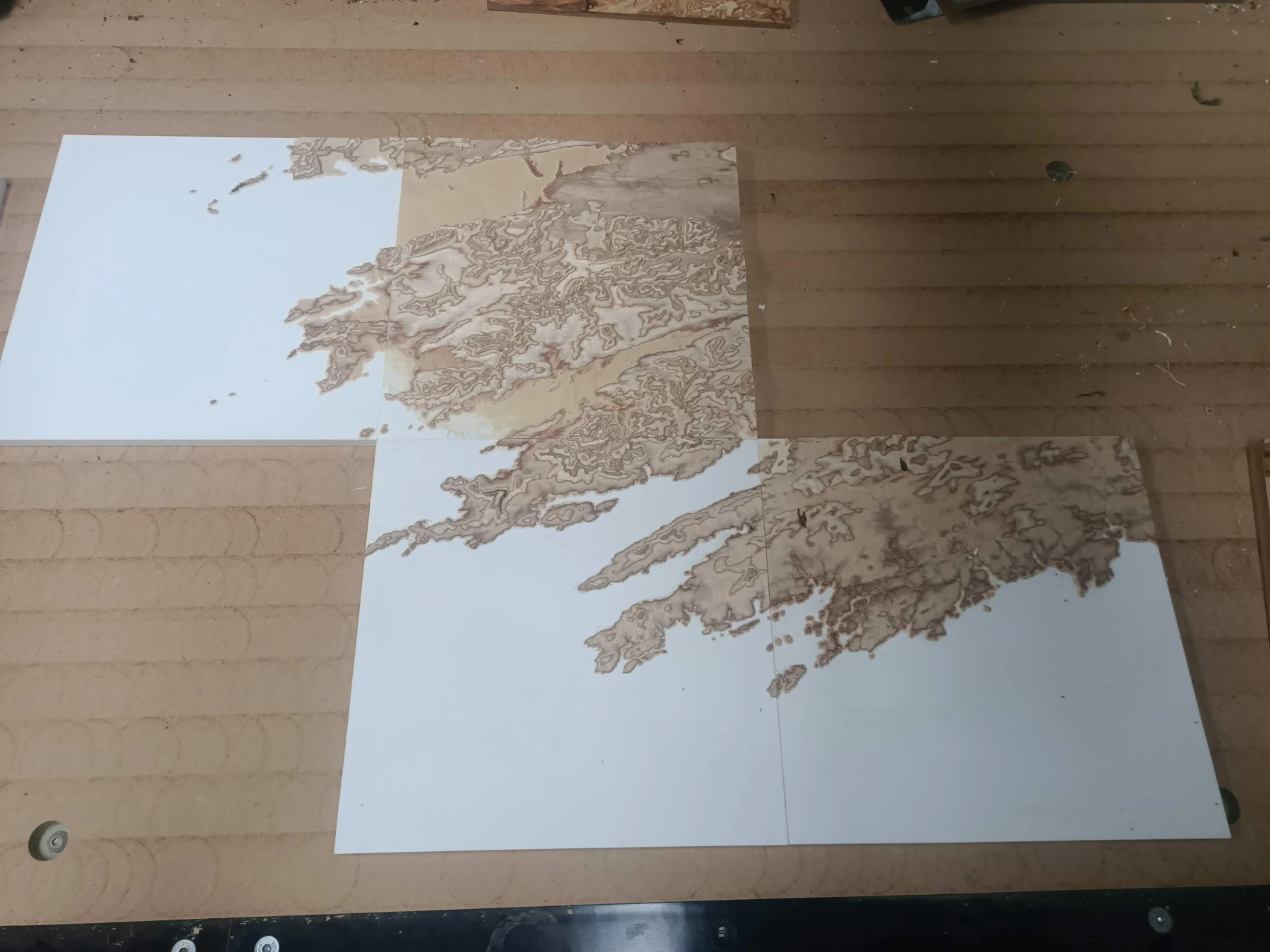 Adjoining birch plywood terrain sections showing the alignment of the landscape
