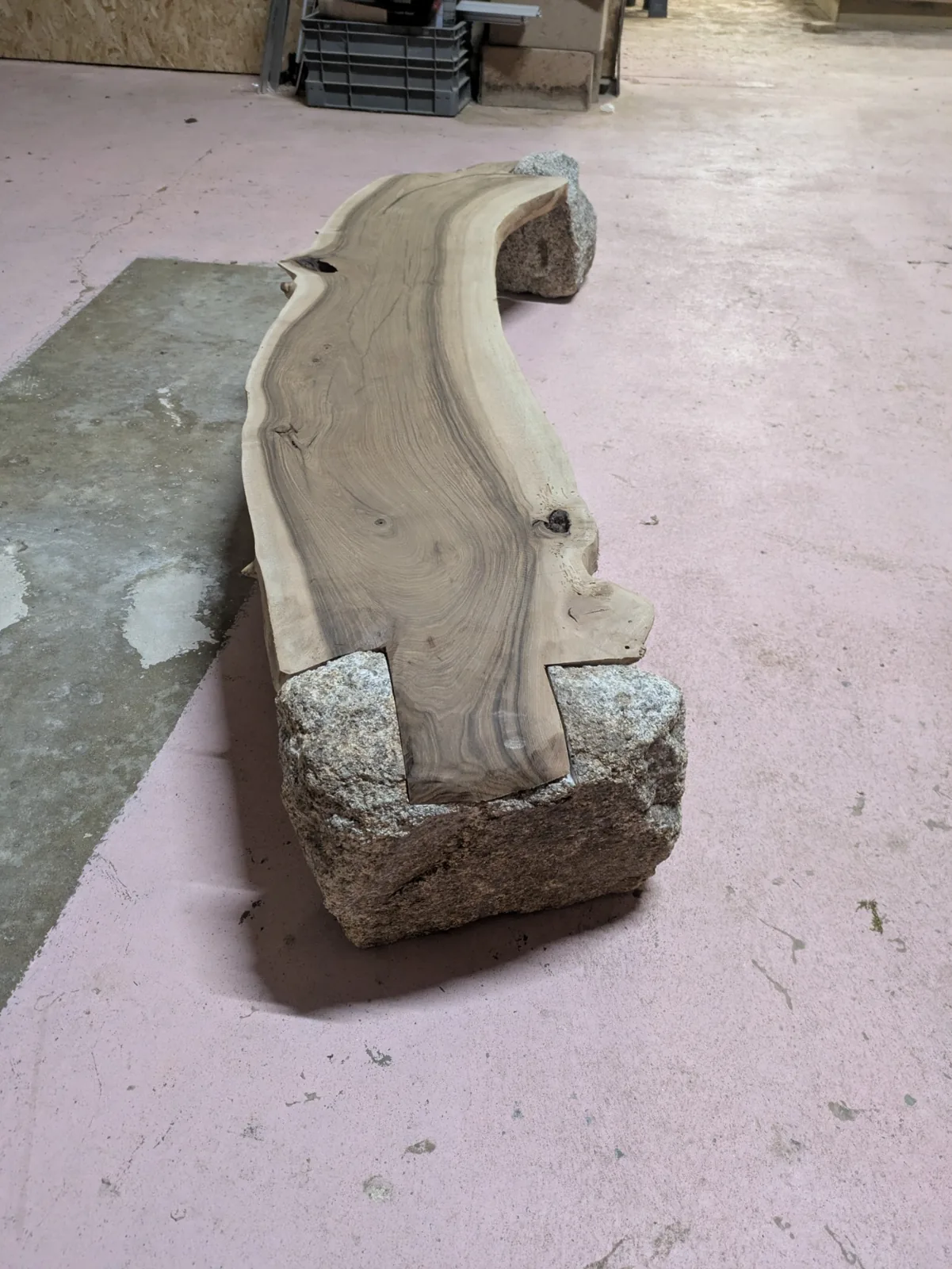 The assembled bench on the workshop floor before oiling