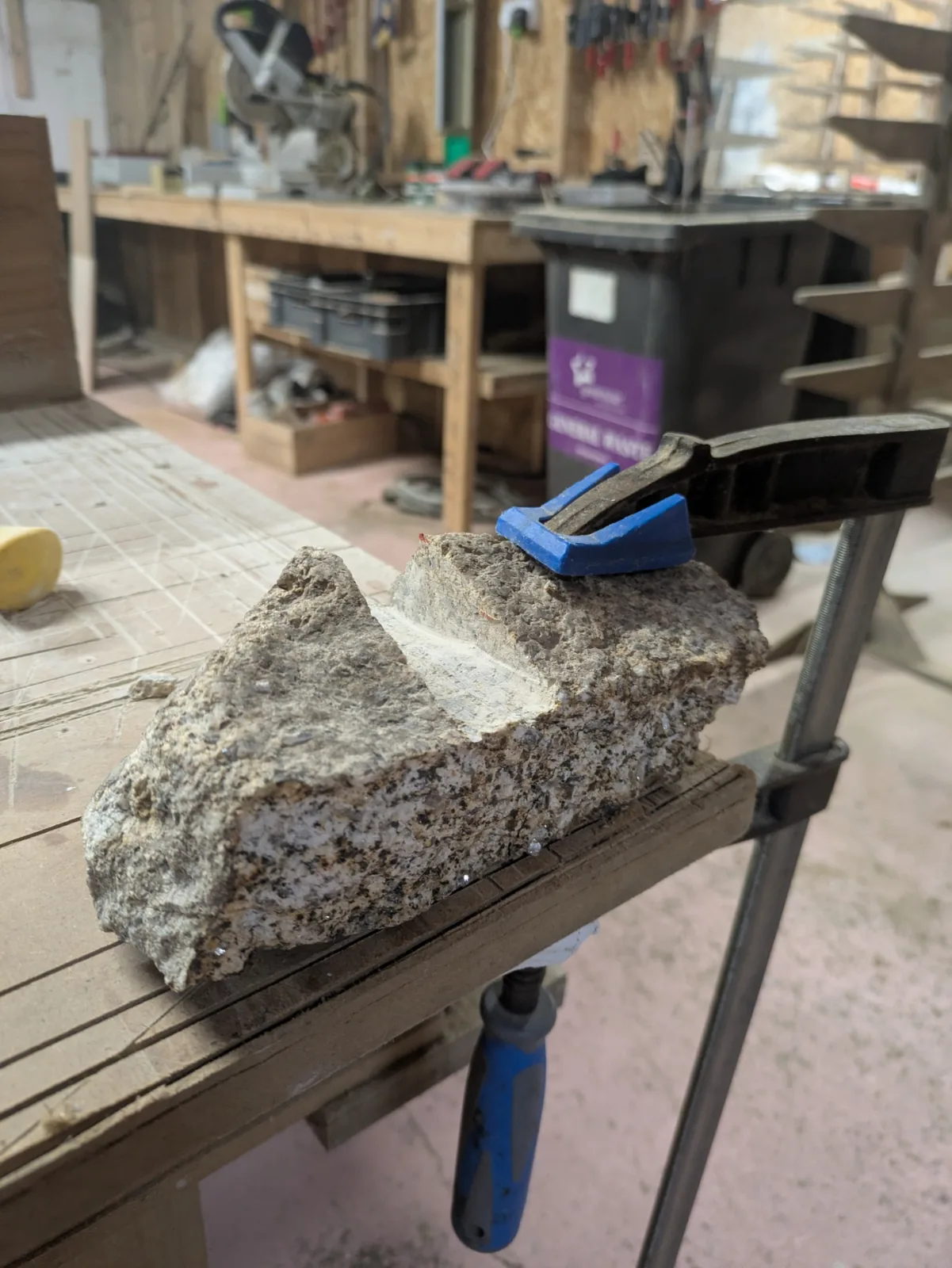Small trial notches cut into a piece of granite